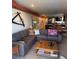 Comfortable living room with sectional sofa and coffee table at 700 Beach Ne Dr # 401, St Petersburg, FL 33701