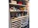 Well-organized storage closet with many shelves and drawers at 700 Beach Ne Dr # 401, St Petersburg, FL 33701