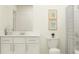 Clean bathroom with white vanity, toilet and shower at 9252 Bonita Mar Dr, Parrish, FL 34219