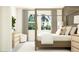 Main bedroom with canopy bed and ample natural light at 9760 Minnow Ray Dr, Land O Lakes, FL 34638