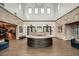 Elegant community lobby with a stylish reception desk and comfortable seating at 9760 Minnow Ray Dr, Land O Lakes, FL 34638
