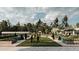 Community green space with playground and garden at 9760 Minnow Ray Dr, Land O Lakes, FL 34638