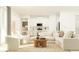 Open living room featuring a sectional sofa and kitchen at 9760 Minnow Ray Dr, Land O Lakes, FL 34638