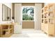Bright home office with built in shelving and large window at 9760 Minnow Ray Dr, Land O Lakes, FL 34638