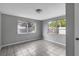 Bedroom with tile flooring,dual windows, and neutral walls at 10515 118Th Ave, Largo, FL 33773