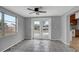 Dining room with tile floor, ceiling fan, and access to kitchen at 10515 118Th Ave, Largo, FL 33773