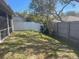 Fenced backyard with grassy area and privacy fence at 13184 73Rd Ave, Seminole, FL 33776