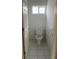 Small half bathroom with toilet and grab bar at 13184 73Rd Ave, Seminole, FL 33776