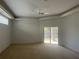 Spacious bedroom with sliding glass doors to patio at 13184 73Rd Ave, Seminole, FL 33776