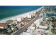 Aerial view showing home's proximity to beach and ocean at 13405 Gulf Blvd, Madeira Beach, FL 33708