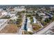 Aerial view of modern townhouses in a vibrant urban setting, close to city amenities at 1501 N Morgan St # 7, Tampa, FL 33602