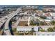 Aerial perspective of townhouses situated near a highway, offering convenient access to the city at 1501 N Morgan St # 7, Tampa, FL 33602