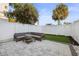 Private backyard with patio, fire pit, and artificial turf at 1501 N Morgan St # 7, Tampa, FL 33602