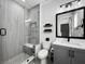 Modern bathroom with gray tile and a glass shower at 1501 N Morgan St # 7, Tampa, FL 33602