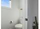 Simple bathroom with toilet and small shelf at 1501 N Morgan St # 7, Tampa, FL 33602