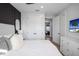 Spacious bedroom with a cozy bed and white closet doors at 1501 N Morgan St # 7, Tampa, FL 33602