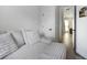 Small bedroom with a daybed and view of hallway at 1501 N Morgan St # 7, Tampa, FL 33602