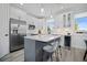 Modern kitchen with stainless steel appliances and an island at 1501 N Morgan St # 7, Tampa, FL 33602