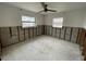 Large bedroom with exposed framing, ready for renovation at 1798 Shore Acres Ne Blvd, St Petersburg, FL 33703