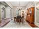 Formal dining room with hardwood floors and a charming wine storage at 19116 Sweet Clover Ln, Tampa, FL 33647