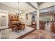 Rustic dining area with a wine cellar and hardwood floors at 19116 Sweet Clover Ln, Tampa, FL 33647