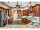 Modern kitchen featuring stainless steel appliances and granite countertops at 19116 Sweet Clover Ln, Tampa, FL 33647