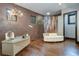 Elegant bathroom with stained glass windows, stylish vanity, and a cozy seating area, offering a luxurious retreat at 200 Brightwaters Ne Blvd, St Petersburg, FL 33704