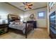 Well-lit bedroom featuring a comfortable bed, stylish nightstands, and dark wood furniture at 200 Brightwaters Ne Blvd, St Petersburg, FL 33704