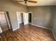 Bright bedroom featuring light brown laminate wood floors at 2226 Ridgemore Dr, Valrico, FL 33594