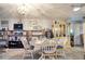 Charming dining area with white table and chairs, and built-in hutch at 2679 Sabal Springs Cir # 102, Clearwater, FL 33761