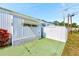 White storage shed with double doors, providing ample storage space at 27466 Us Highway 19 N # 54, Clearwater, FL 33761