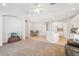 Spacious living room featuring neutral colors, recessed lighting, and an open floor plan to the kitchen at 2813 Punta Palma Ct, Holiday, FL 34691