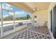 Covered outdoor patio featuring a seating area with views of the backyard at 2813 Punta Palma Ct, Holiday, FL 34691