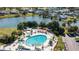 Large oval-shaped community pool at 302 Canton Ct # 63, Sun City Center, FL 33573