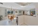 Bright dining area with table and chairs, view to backyard at 302 Canton Ct # 63, Sun City Center, FL 33573