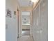 Hallway with access to bedroom and closets at 302 Canton Ct # 63, Sun City Center, FL 33573