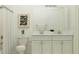 Clean bathroom with double vanity, and a shower/tub combo at 31575 Cardinal Yard Dr, San Antonio, FL 33576