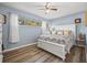 Spacious bedroom with a king-size bed and light blue walls at 36639 Jefferson Ave, Dade City, FL 33523