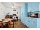 Bright kitchen nook with wood table and chairs and a coffee bar at 36639 Jefferson Ave, Dade City, FL 33523