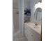 Bathroom features a vanity with storage, modern fixtures, and a walk in shower at 37642 Amigo Dr, Zephyrhills, FL 33541