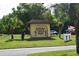 Spanish Trails West, a resident owned 55+ community, is denoted by cacti on its tan entrance sign at 37642 Amigo Dr, Zephyrhills, FL 33541