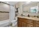 Clean bathroom with granite vanity and tile shower/tub combo at 3906 Bloomingdale Ave, Valrico, FL 33596