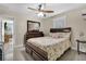 Guest bedroom with a queen-size bed and an ensuite bathroom at 3906 Bloomingdale Ave, Valrico, FL 33596