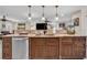 Spacious kitchen island with granite countertop and modern cabinetry at 3906 Bloomingdale Ave, Valrico, FL 33596