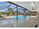 Screened pool and patio area, perfect for relaxation at 3906 Bloomingdale Ave, Valrico, FL 33596