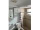 Clean bathroom with white toilet and shower/tub combo at 4221 Touchton Pl # A, New Port Richey, FL 34652