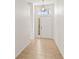 Light-filled entryway with tile flooring and a view to the adjacent room at 4251 Whittner Dr, Land O Lakes, FL 34639