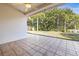 Spacious patio overlooking backyard at 4251 Whittner Dr, Land O Lakes, FL 34639