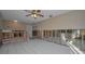 Spacious living room features tiled floors and a partial wall with a view to other rooms at 523 Georgia Ave, Crystal Beach, FL 34681