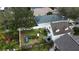 Aerial view showcasing the home's backyard with playground and patio at 5607 Tanagergrove Way, Lithia, FL 33547